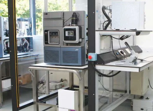 Dedicated enclosure for machine frame with integrated desk
